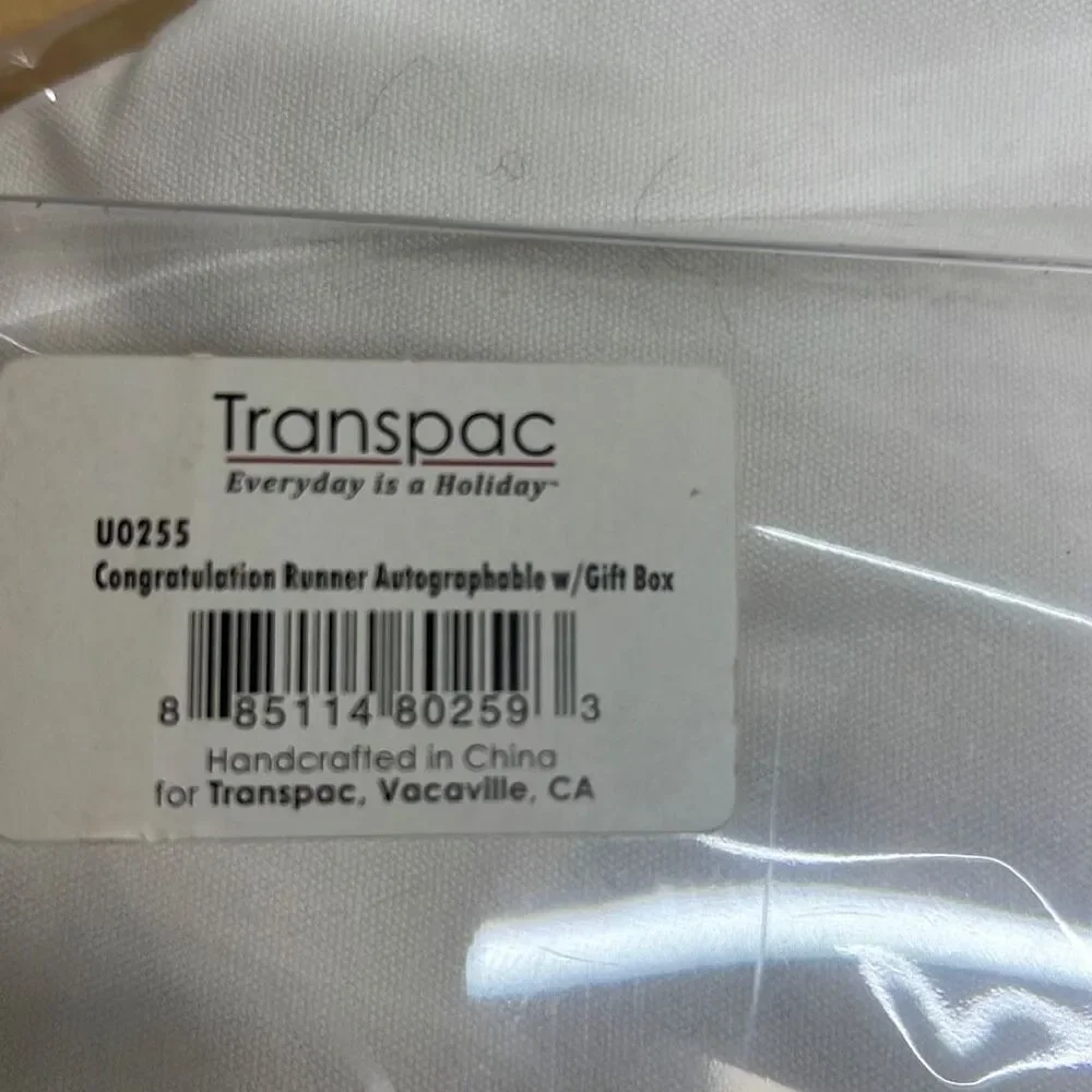 Congratulations table drape write on 28” x 80” never opened colorful print on wh